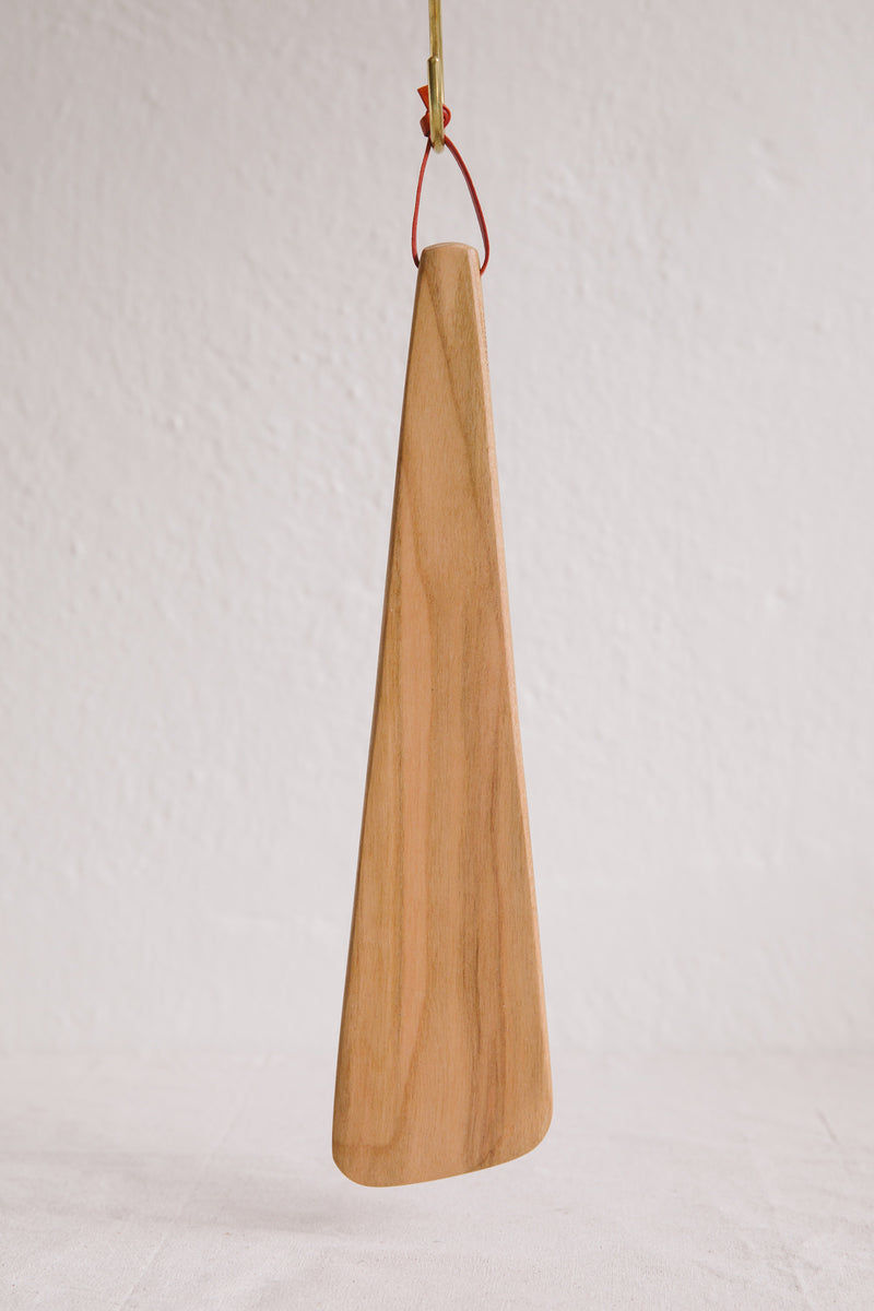 Handmade by Ambrose Vevers these spatulas made from cherry wood and finished with food safe oil. A small leather loop at the top of the handle for easy display and storage.