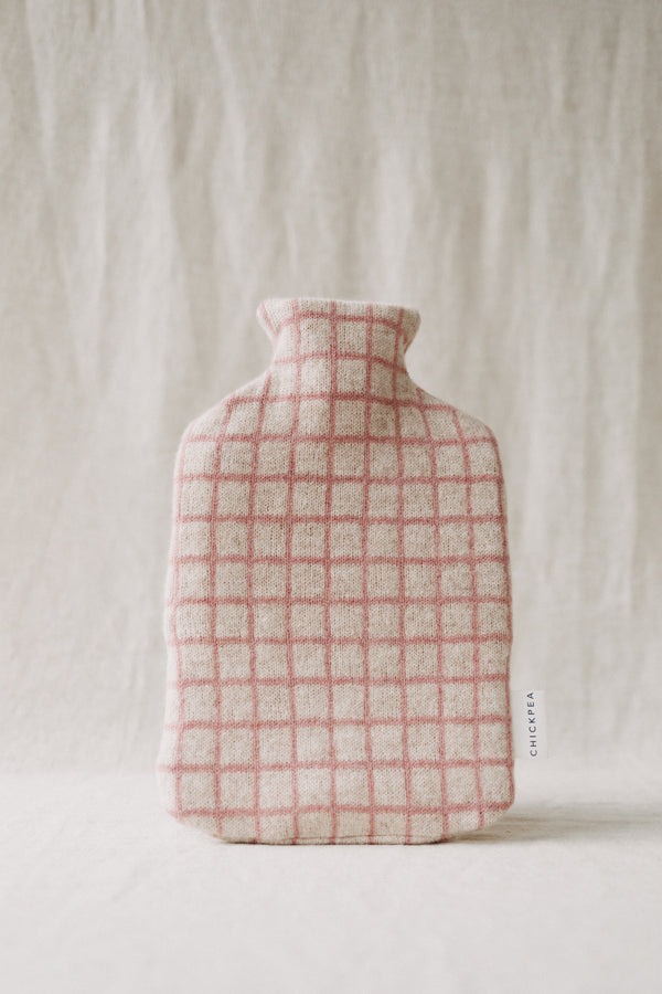 Thin pink stripe grid pattern with cream background soft lambswool hot water bottle made by British maker Chickpea