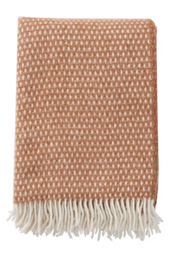 Super soft, dot pattern lambswool blankets. Warm neutral coloured. Finished with a tassel trim