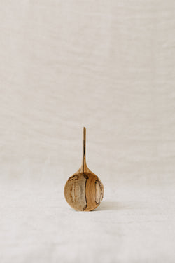 Small hand carved multi purpose scoop made from sustainably sourced wood. shallow scoop and a delicate long handle.