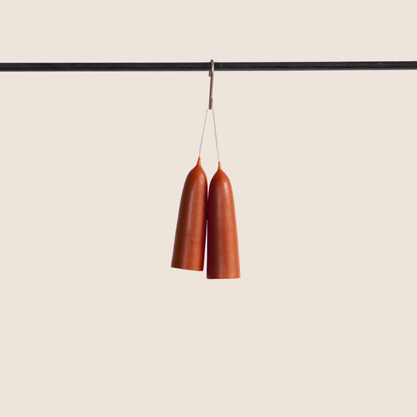 Pair of poppy red colour candles hanging made from beeswax, Ondine Ash