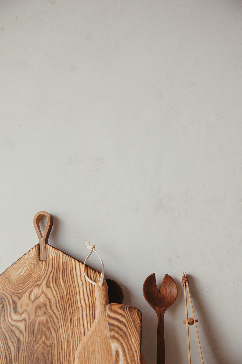 Ambrose Vevers wooden tongs amongst other wooden objects on display