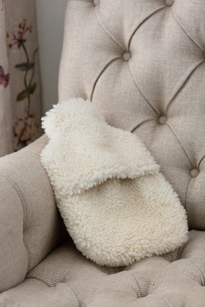 Hot water bottle made from sheepskin and cream coloured